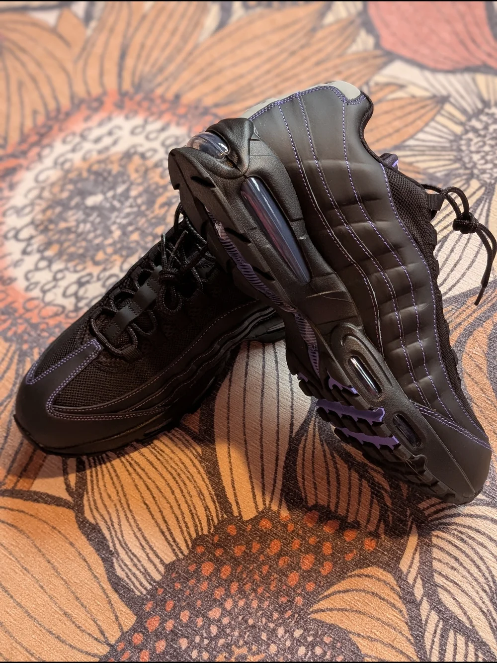 Nike Black Sneakers with Purple Accents